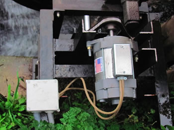 Presto Wind M24 permanent magnet alternator installed on water wheel